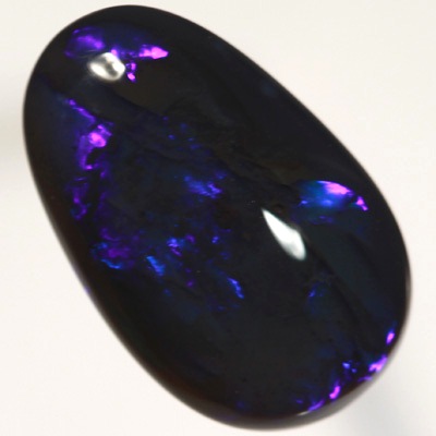 SOLID BLACK OPAL Bright electric blue roling flashes SEE VIDEOS